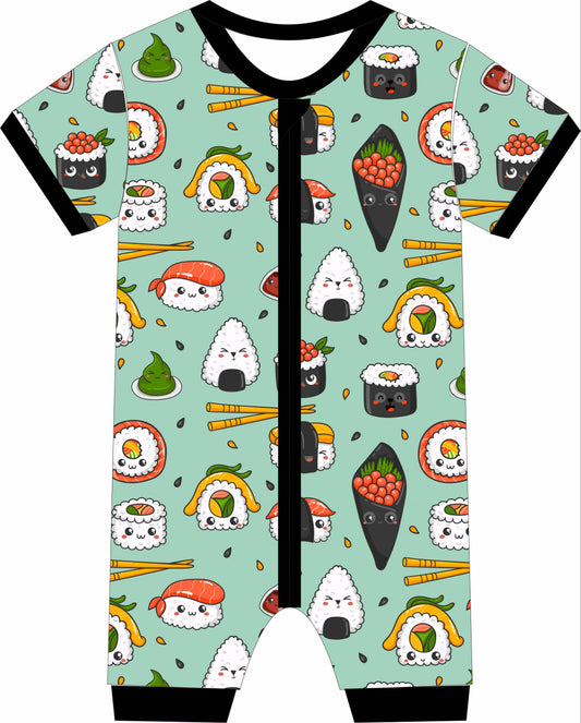 Children's jammies with cartoon sushi design on a light blue background
